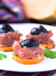 Penfield Olives food service page pic, canape with shaved salmon and kalamata olives.