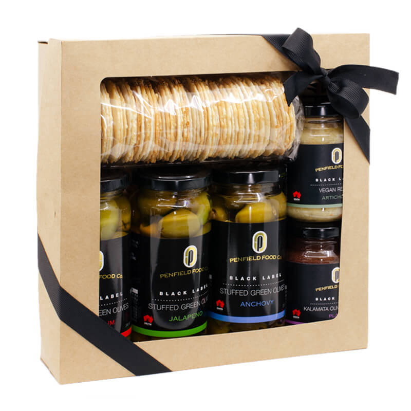 Penfield Olives gift hamper pic filled with their Wafer Buscuits, Green Stuffed Olives x 3, Vegan Relish and Tapenade.